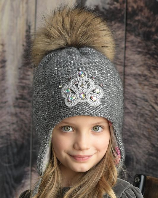 Модные детские вязаные шапки: броский дизайн, лаконичные фасоны